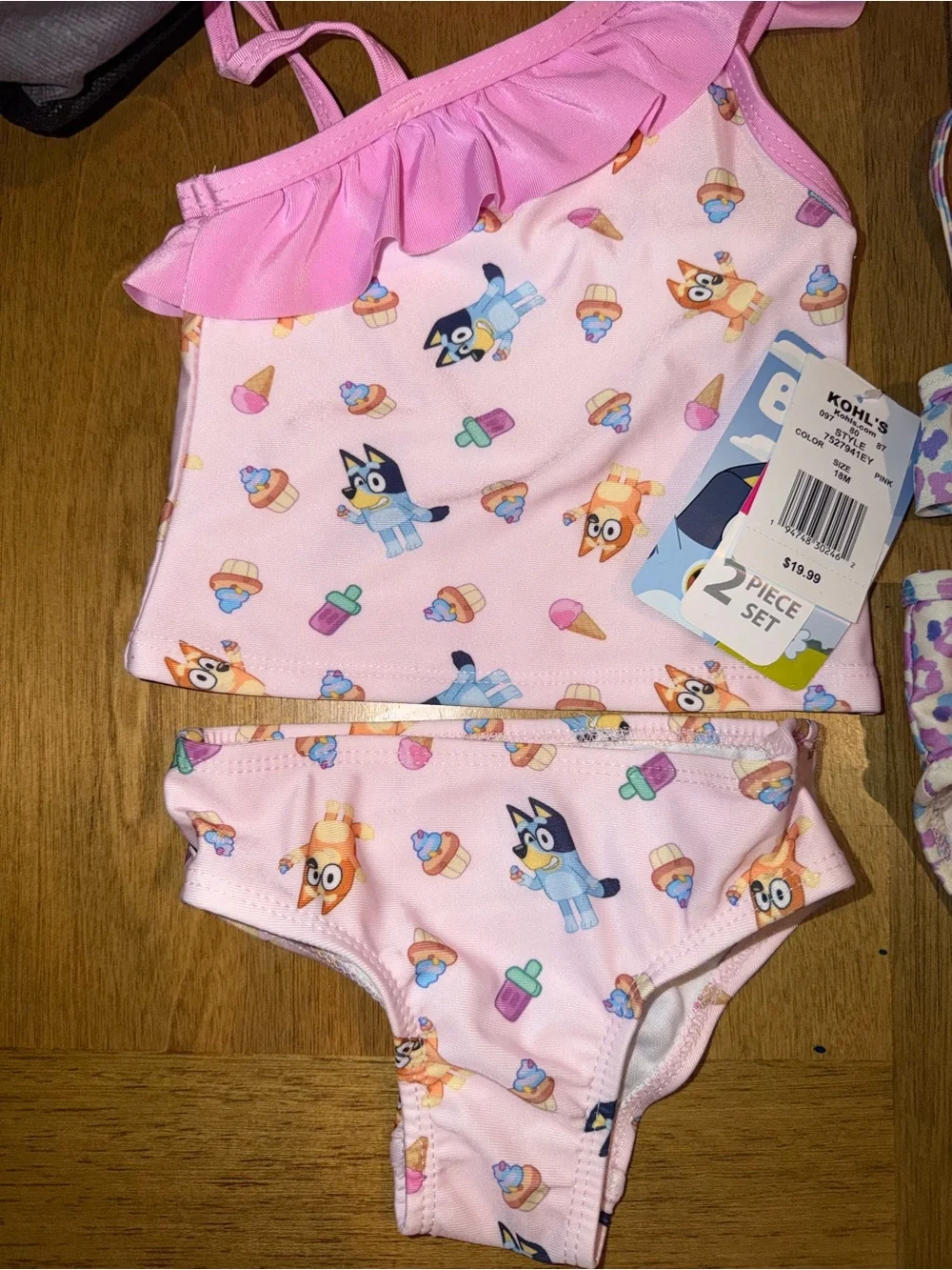 Two baby girl bathing suits